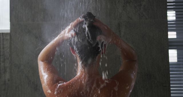 Young Caucasian woman enjoys a refreshing shower at home - Download Free Stock Photos Pikwizard.com