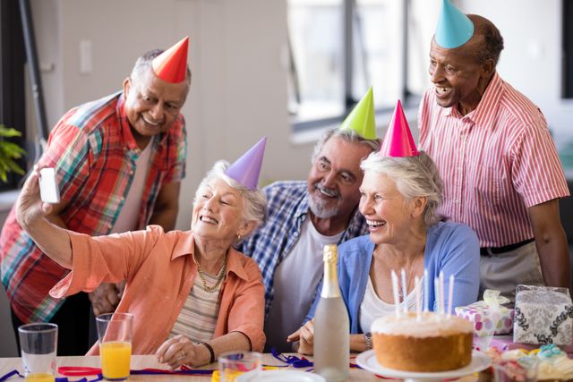 Smiling senior people taking selfie at party - Download Free Stock Photos Pikwizard.com