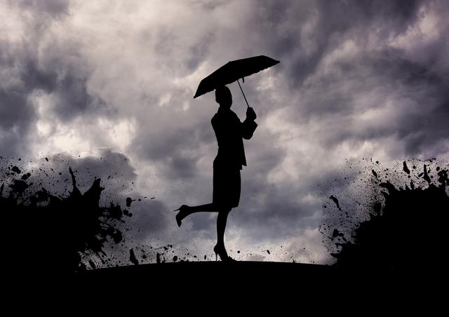Silhouette of woman standing with umbrella - Download Free Stock Photos Pikwizard.com