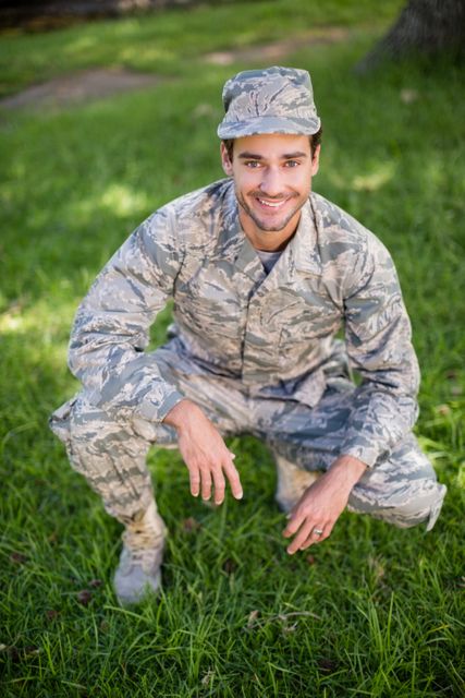 Portrait of soldier smiling in park - Download Free Stock Photos Pikwizard.com