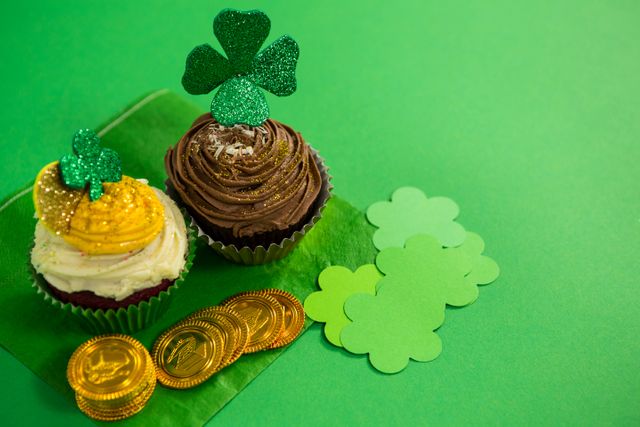 St Patricks Day shamrock on the cupcake with gold coins - Download Free Stock Photos Pikwizard.com