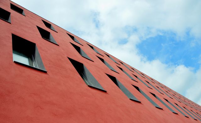 Red Concrete Building Under Cloudy Sky during Daytime - Download Free Stock Photos Pikwizard.com