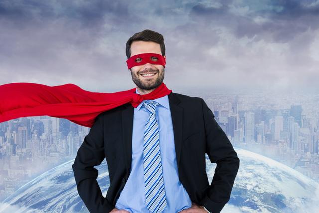 Portrait of happy businessman wearing superhero costume overlooking cityscape - Download Free Stock Photos Pikwizard.com