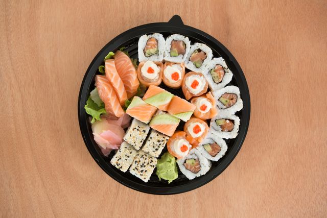 Various sushi rolls in platter - Download Free Stock Photos Pikwizard.com
