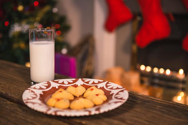 Christmas cookies on plate with a glass of milk - Download Free Stock Photos Pikwizard.com