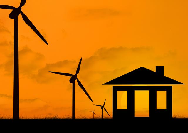 Silhouette wind turbine and house model at dusk - Download Free Stock Photos Pikwizard.com