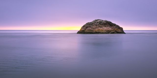 Photo of Island on Sea during Sunset - Download Free Stock Photos Pikwizard.com