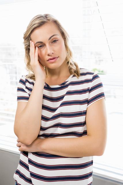 Depressed woman in deep thought - Download Free Stock Photos Pikwizard.com