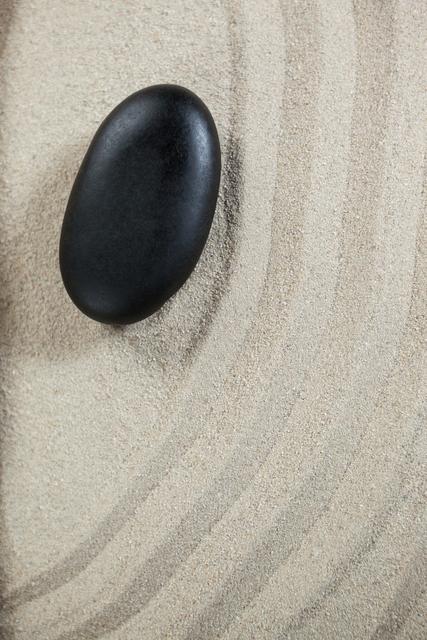 Black pebble stone - Download Free Stock Photos Pikwizard.com