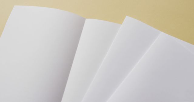 Image of white sheets of paper with copy space on yellow background - Download Free Stock Photos Pikwizard.com