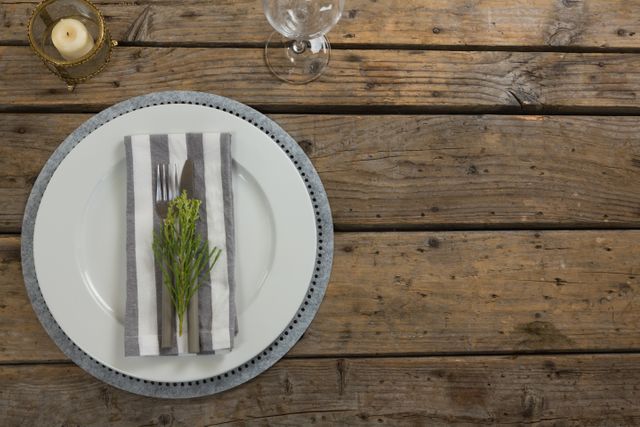 Elegance table setting on wooden plank - Download Free Stock Photos Pikwizard.com