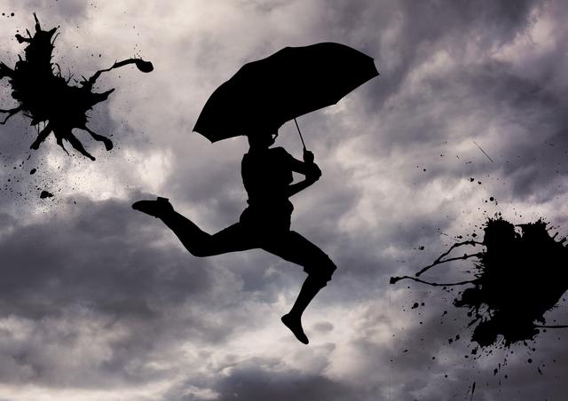 Digital composition of jumping woman silhouette holding an umbrella against sky in background