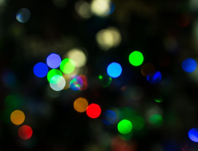 Defocused image of illuminated christmas lights - Download Free Stock Photos Pikwizard.com