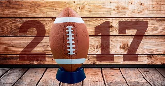 2017 new year message with football against wooden background - Download Free Stock Photos Pikwizard.com