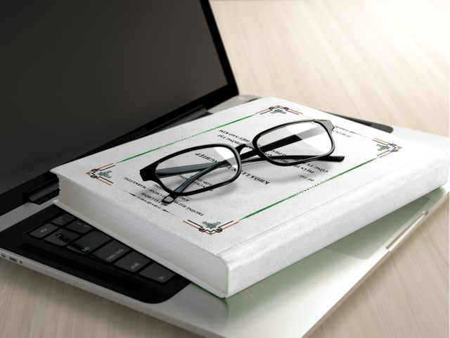 Black Frame Eyeglasses on White Book - Download Free Stock Photos Pikwizard.com