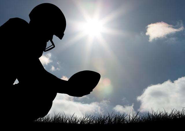 Silhouette of athlete holding ruby ball - Download Free Stock Photos Pikwizard.com