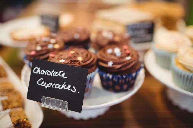 Close-up of chocolate cupcakes at counter - Download Free Stock Photos Pikwizard.com