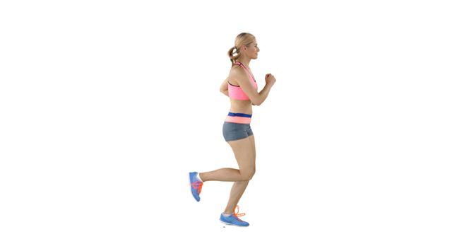 Young Female Runner in Jogging Outfit during Her Regular Training