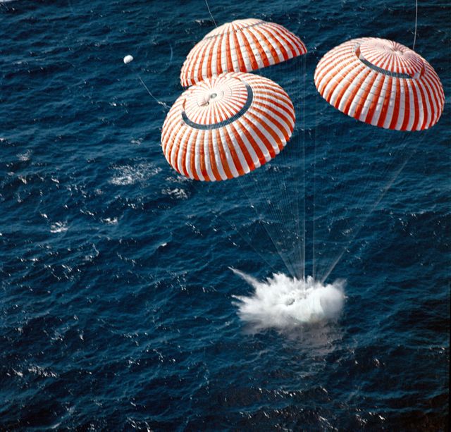 S72-36293 (27 April 1972) --- The Apollo 16 Command Module (CM), with astronauts John W. Young, Thomas K. Mattingly II, and Charles M. Duke Jr. aboard, splashed down in the central Pacific Ocean to successfully conclude their lunar landing mission. The splashdown occurred at 290:37:06 ground elapsed time, 1:45:06 p.m. (CST) Thursday, April 27, 1972, at coordinates of 00:43.2 degrees south latitude and 156:11.4 degrees west longitude. A point approximately 215 miles southeast of Christmas Island. Later the three crewmen were picked up by a helicopter from the prime recovery ship USS Ticonderoga.