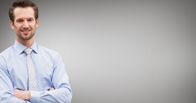 Businessman standing with his arms crossed against grey background - Download Free Stock Photos Pikwizard.com