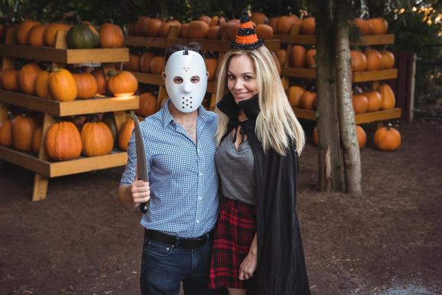 Couple wearing halloween mask and halloween costume - Download Free Stock Photos Pikwizard.com