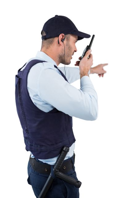 Security officer talking on walkie-talkie - Download Free Stock Photos Pikwizard.com