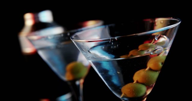 A Martini Glass On A Black Background Stock Photo - Download Image