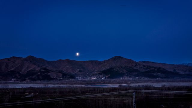 Full Moon Above the Mountain Ranges Near Town - Download Free Stock Photos Pikwizard.com
