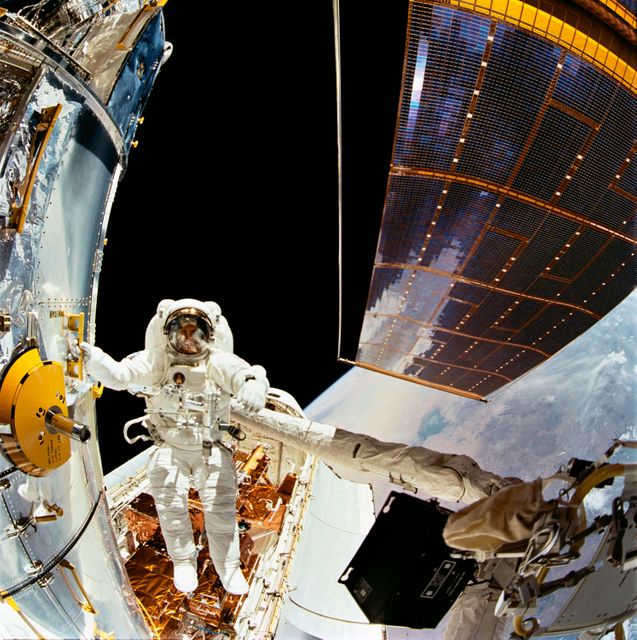 Astronaut Story Musgrave during first of five Hubble Space Telescope EVAs - Download Free Stock Photos Pikwizard.com