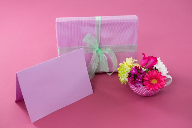 Gift box with happy mother day tag and blank card against pink background - Download Free Stock Photos Pikwizard.com