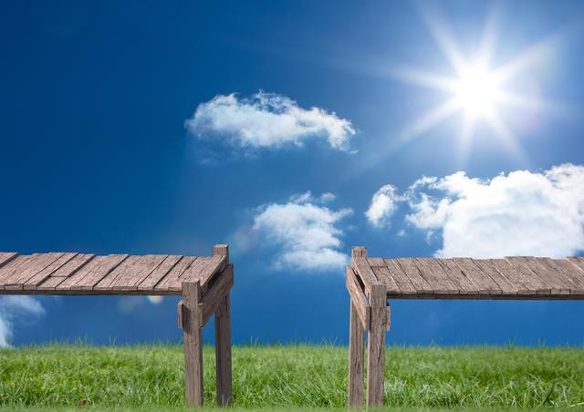 Separated wooden footbridges against sunny sky - Download Free Stock Photos Pikwizard.com