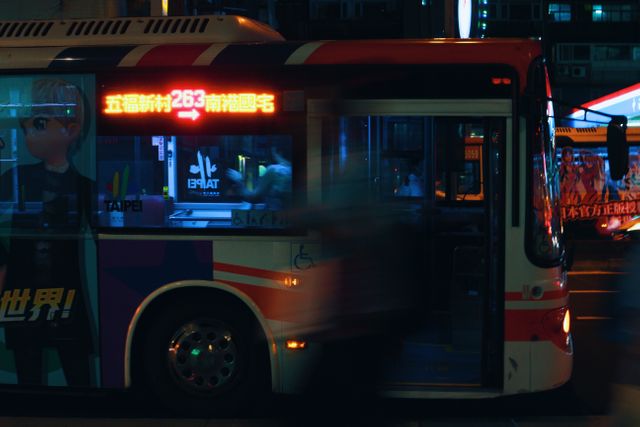 Silver City Bus on a City Street at Night - Download Free Stock Photos Pikwizard.com