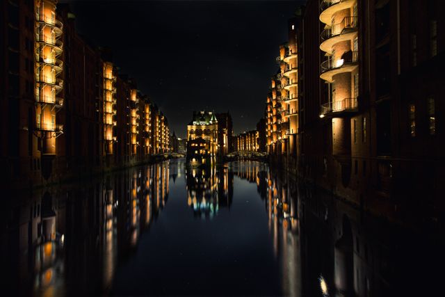 Reflection of Buildings on Water during Nighttime - Download Free Stock Photos Pikwizard.com
