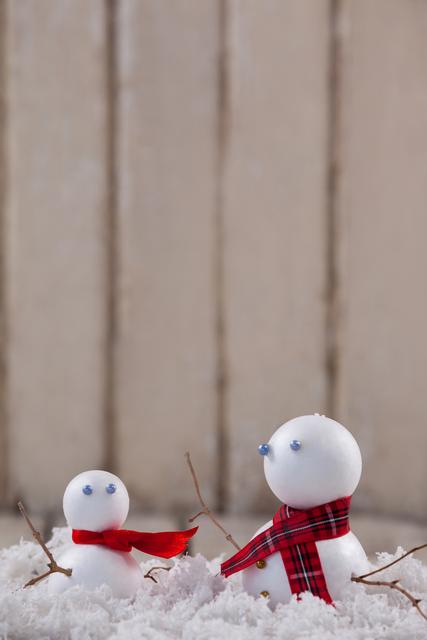 Two snowman with fake snow - Download Free Stock Photos Pikwizard.com