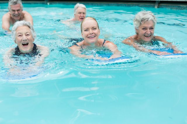 Senior swimmers enjoying in pool - Download Free Stock Photos Pikwizard.com