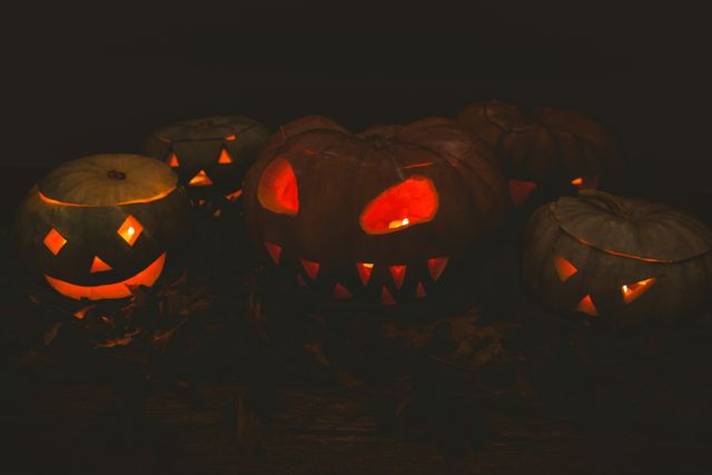 Illuminated jack o lanterns during Halloween - Download Free Stock Photos Pikwizard.com