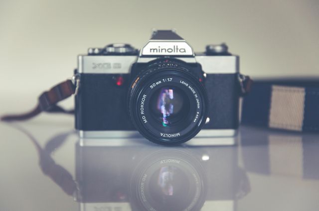 a camera on a table - Download Free Stock Photos Pikwizard.com