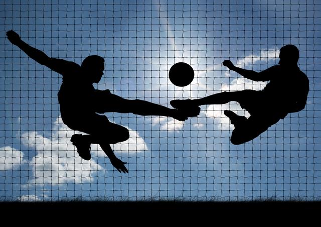Silhouette of athletes playing football on a sunny day - Download Free Stock Photos Pikwizard.com
