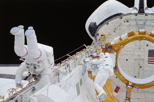 EVA Crewmembers working in the payload bay. - Download Free Stock Photos Pikwizard.com