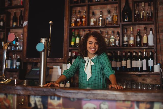 Portrait of beautiful female bar tender - Download Free Stock Photos Pikwizard.com