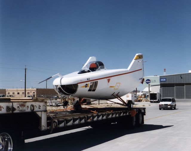 M2-F1 lifting body aircraft on a flatbed truck - Download Free Stock Photos Pikwizard.com