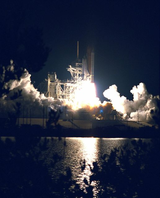 The Space Shuttle Atlantis turns night into day for a few moments as it lifts off on May 15 at 4:07:48 a.m. EDT from Launch Pad 39A on the STS-84 mission. The fourth Shuttle mission of 1997 will be the sixth docking of the Space Shuttle with the Russian Space Station Mir. The commander is Charles J. Precourt. The pilot is Eileen Marie Collins. The five mission specialists are C. Michael Foale, Carlos I. Noriega, Edward Tsang Lu, Jean-Francois Clervoy of the European Space Agency and Elena V. Kondakova of the Russian Space Agency. The planned nine-day mission will include the exchange of Foale for U.S. astronaut and Mir 23 crew member Jerry M. Linenger, who has been on Mir since Jan. 15. Linenger transferred to Mir during the last docking mission, STS-81; he will return to Earth on Atlantis. Foale is slated to remain on Mir for about four months until he is replaced in September by STS-86 Mission Specialist Wendy B. Lawrence. During the five days Atlantis is scheduled to be docked with the Mir, the STS-84 crew and the Mir 23 crew, including two Russian cosmonauts, Commander Vasily Tsibliev and Flight Engineer Alexander Lazutkin, will participate in joint experiments. The STS-84 mission also will involve the transfer of more than 7,300 pounds of water, logistics and science equipment to and from the Mir. Atlantis is carrying a nearly 300-pound oxygen generator to replace one of two Mir units which have experienced malfunctions. The oxygen it generates is used for breathing by the Mir crew