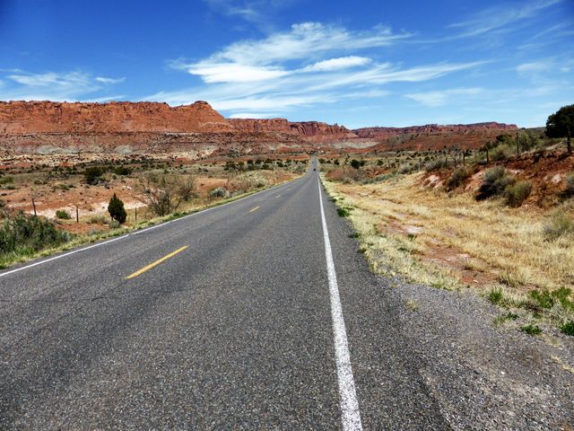 Road Passing Through a Desert - Download Free Stock Photos Pikwizard.com