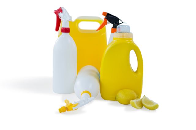 Cleaning liquid bottles with lemon - Download Free Stock Photos Pikwizard.com