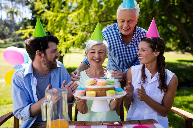 Happy family celebrating birthday party - Download Free Stock Photos Pikwizard.com