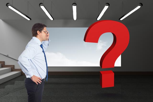 Digital composite image of businessman looking at red question mark - Download Free Stock Photos Pikwizard.com