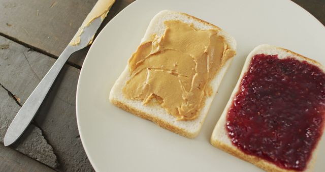 Knife and Sandwich with Bread and Peanut Butter Stock Photo