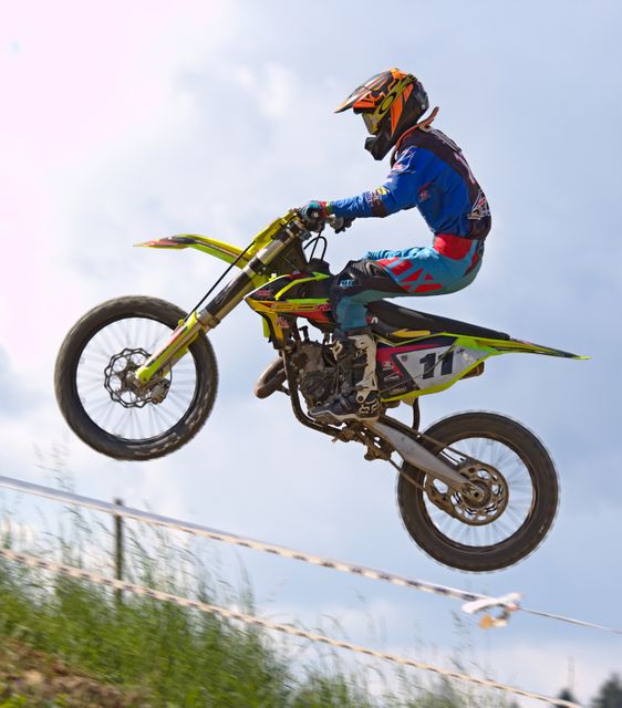 Person Doing Stunt in Motocross Dirt Bike - Download Free Stock Photos Pikwizard.com