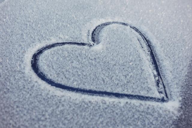 Heart shape drawn on car bonnet covered with snow - Download Free Stock Photos Pikwizard.com
