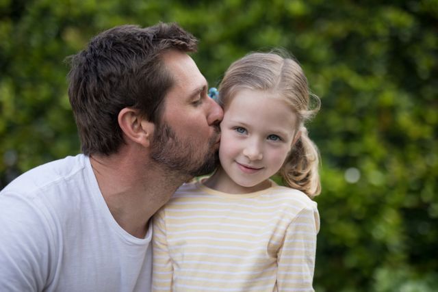  Father kissing his young girl - Download Free Stock Photos Pikwizard.com